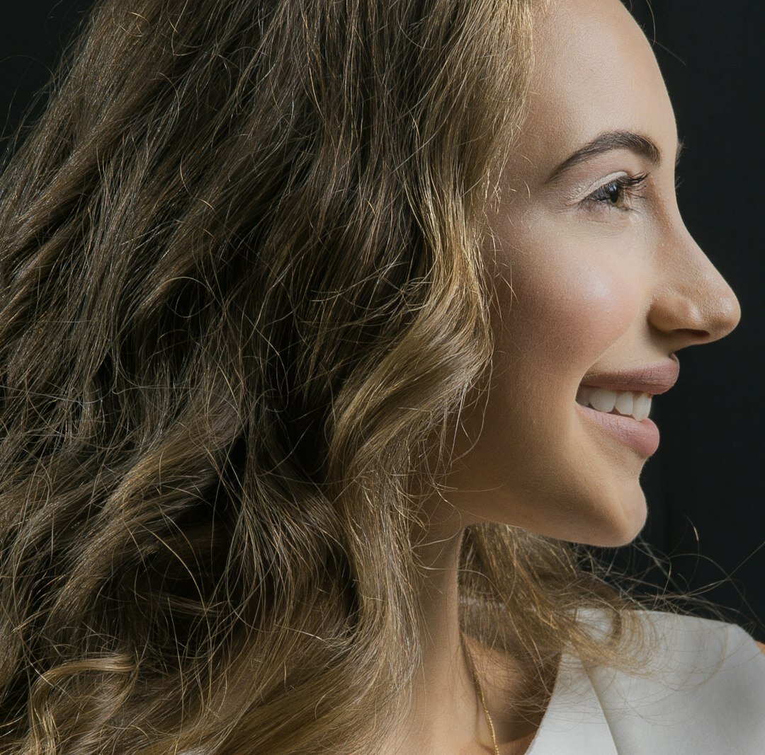 Portrait of a smiling Brazilian woman, personal development mentor