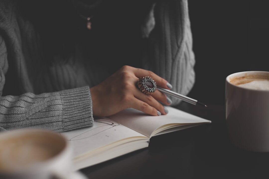 woman writing in journal