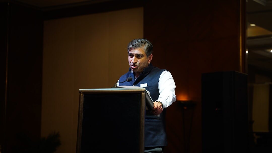 confident speaker presenting to audience
